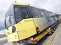 The first of forty new Metrolink trams, number 3001, arrives after its journey from Vienna in July 2009. They will enter service on existing Metrolink routes towards the end of 2009 and will run to Oldham and Rochdale in 2011.  Tony Young